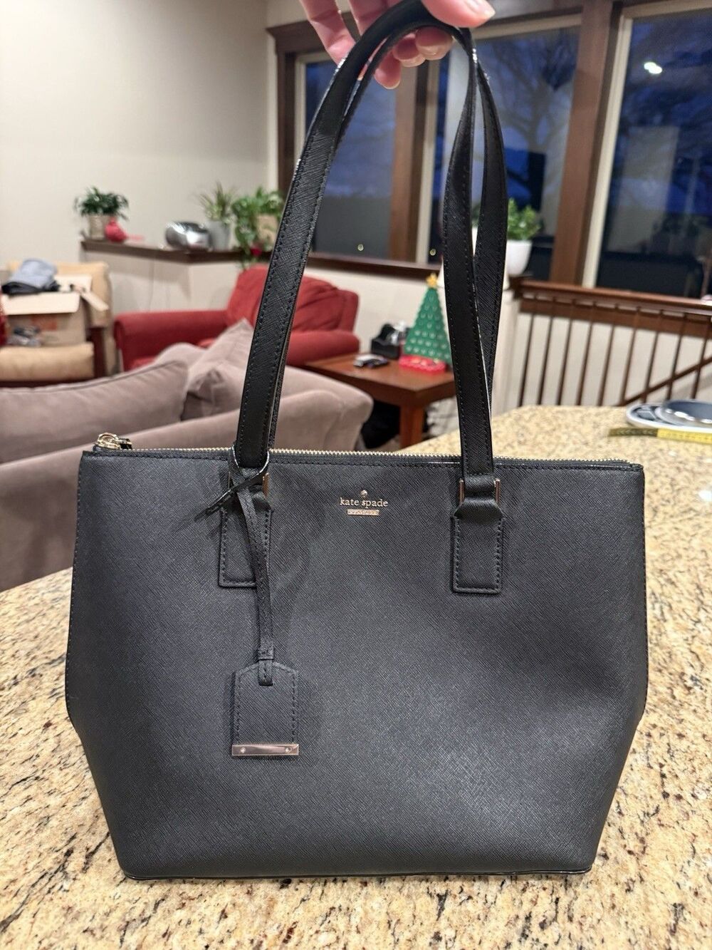 Kate Spade Black Tote  14”x9.5”x5.5” 100% Leather Outer Stripe Interior Pockets